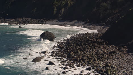 still shot of rocky coastline at the gaztelugatxe islet in spain