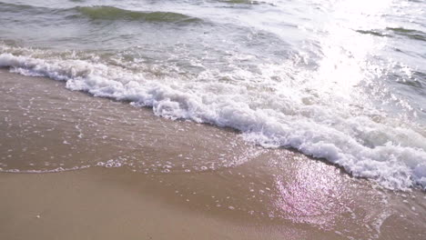 slow motion . waves at sunset, ocean beach in pattaya thailand .