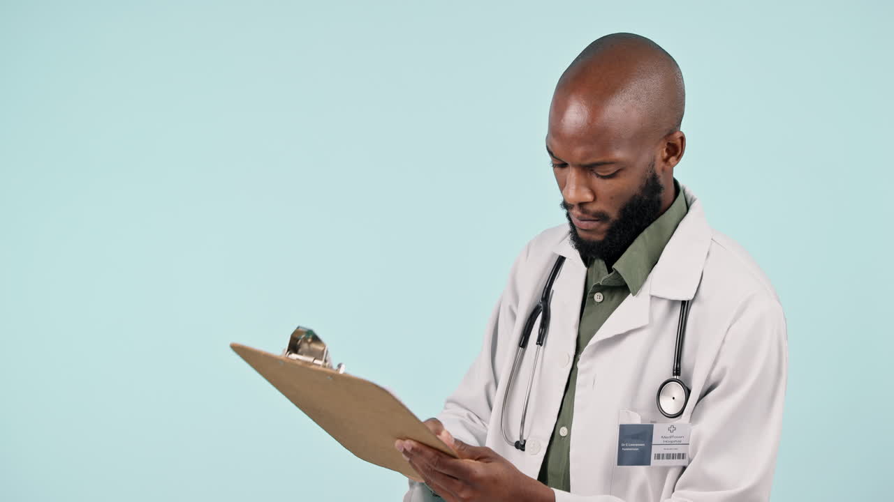 Black man, doctor and writing on clipboard