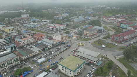 foggy morning beautiful drone view of sri aman town at batang lupar river, during regatta and pesta benak,sarawak, borneo.