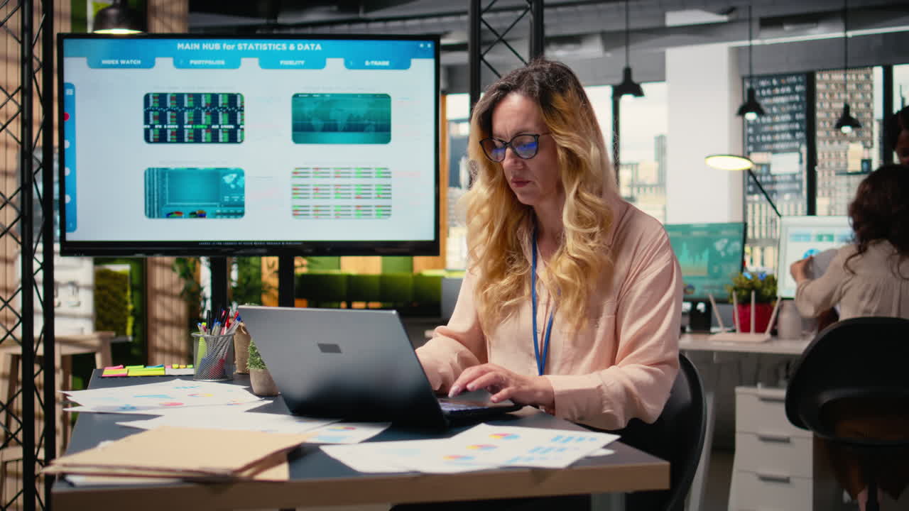 Vertical Video Ambitious entrepreneur writes a report informed by real time data insights