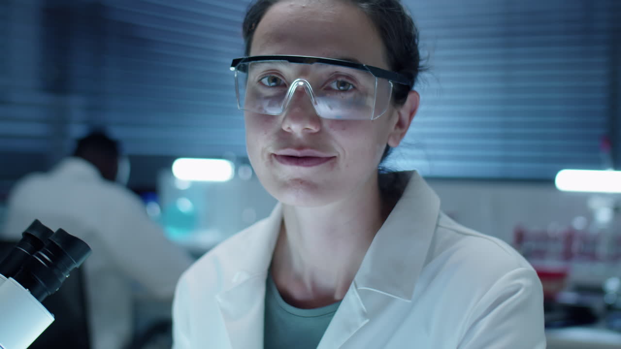 Portrait of Young Female Scientist in Lab