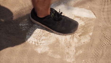 baseball base on dirt