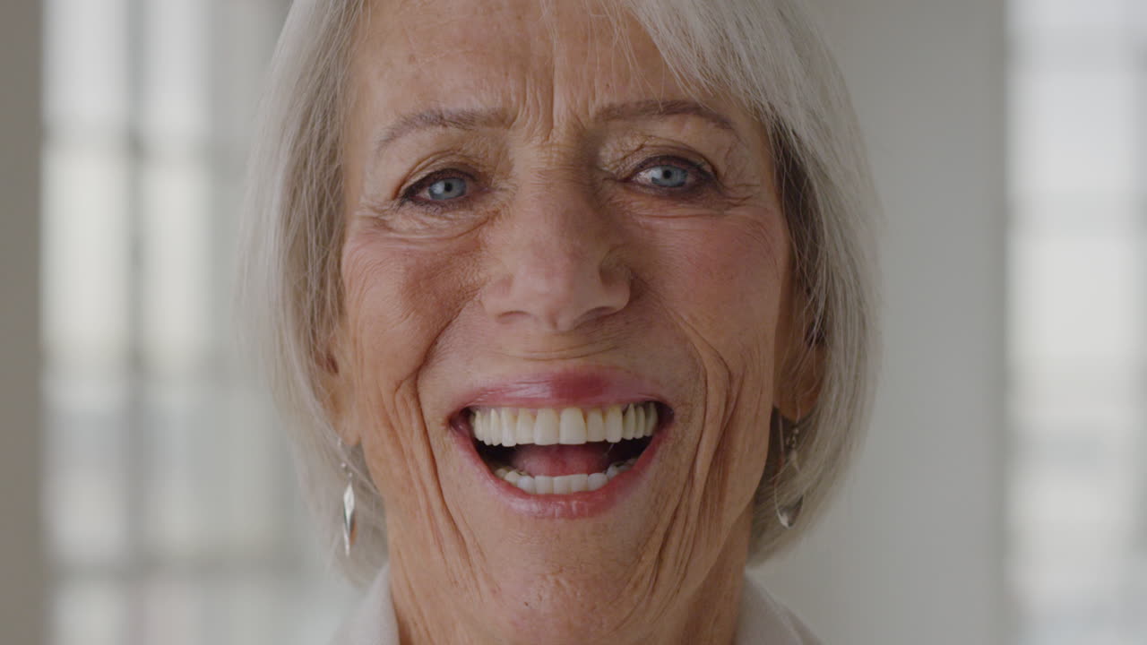 Portrait of mature woman smiling at home