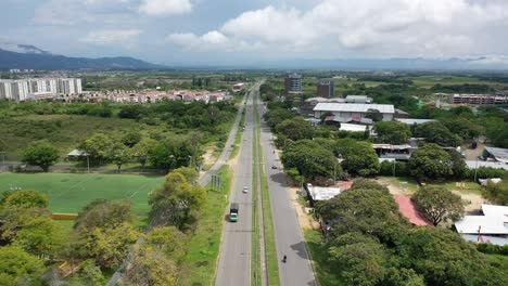 video of road drone zooming out of the road backwards