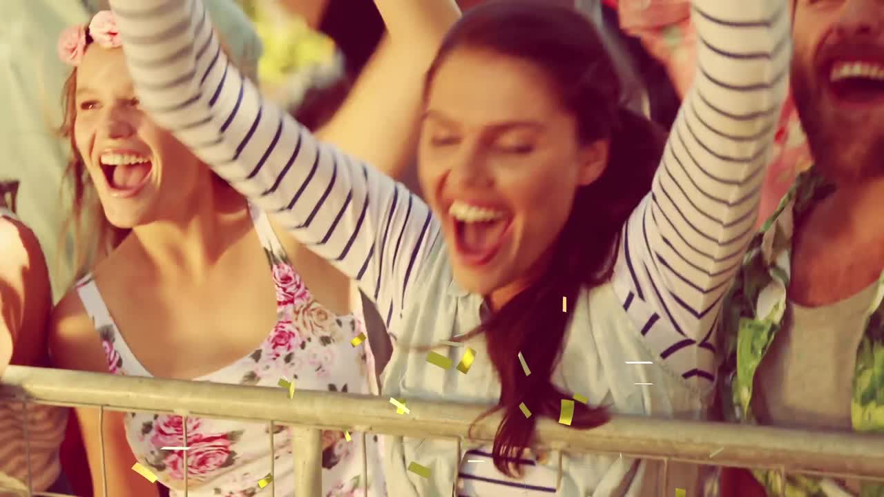 밖에서 춤추는 행복한 사람들 위에 떨어지는 금 콘페티의 애니메이션