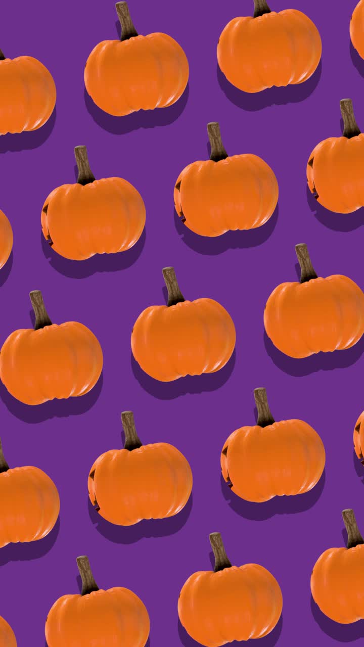 Blinking Jack-o'-Lanterns and Pumpkins on Purple Background