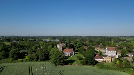 A-distant-arc-shot-of-St-Andrew's-church-in-Wickhambreaux