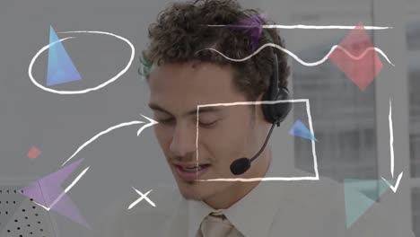 Animation-of-shapes-over-businessman-with-headset-in-office