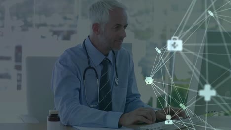 digital composite video of web of connections with icons moving against doctor using computer