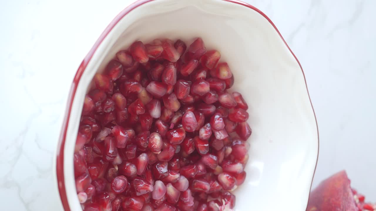 Pomegranate Seeds in a Bowl