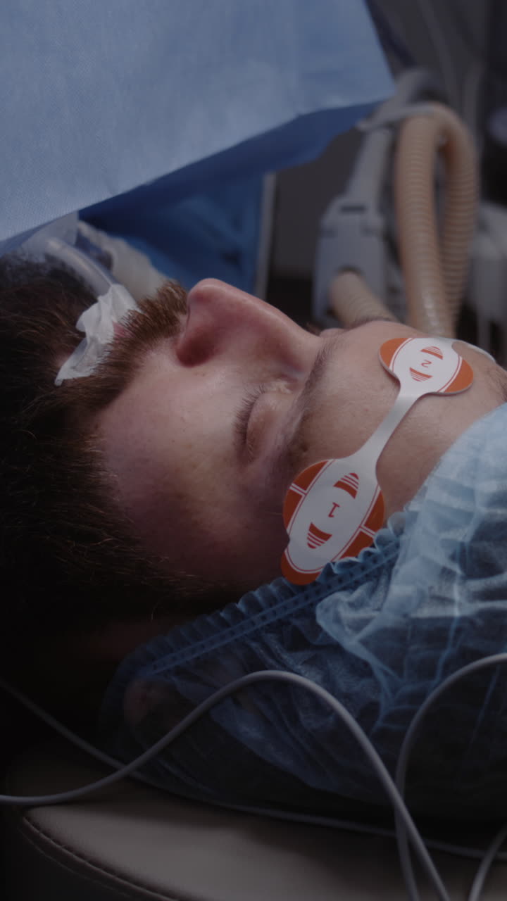 Close up of face of patient during surgery 4k 2025 07 24 06 40 56 utc.mov | adult, anesthesia, assistance, breathing tube