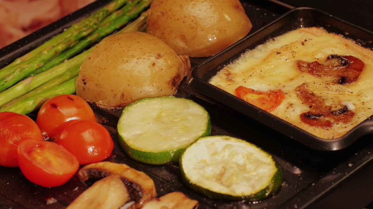 French Swiss or Spanish restaurant with traditional tapas food, Spanish cuisine, delicious tapas and cheese plate, bruschetta with cheese, olives dry tomatoes and tasty sandwich bar appetizer, buffet