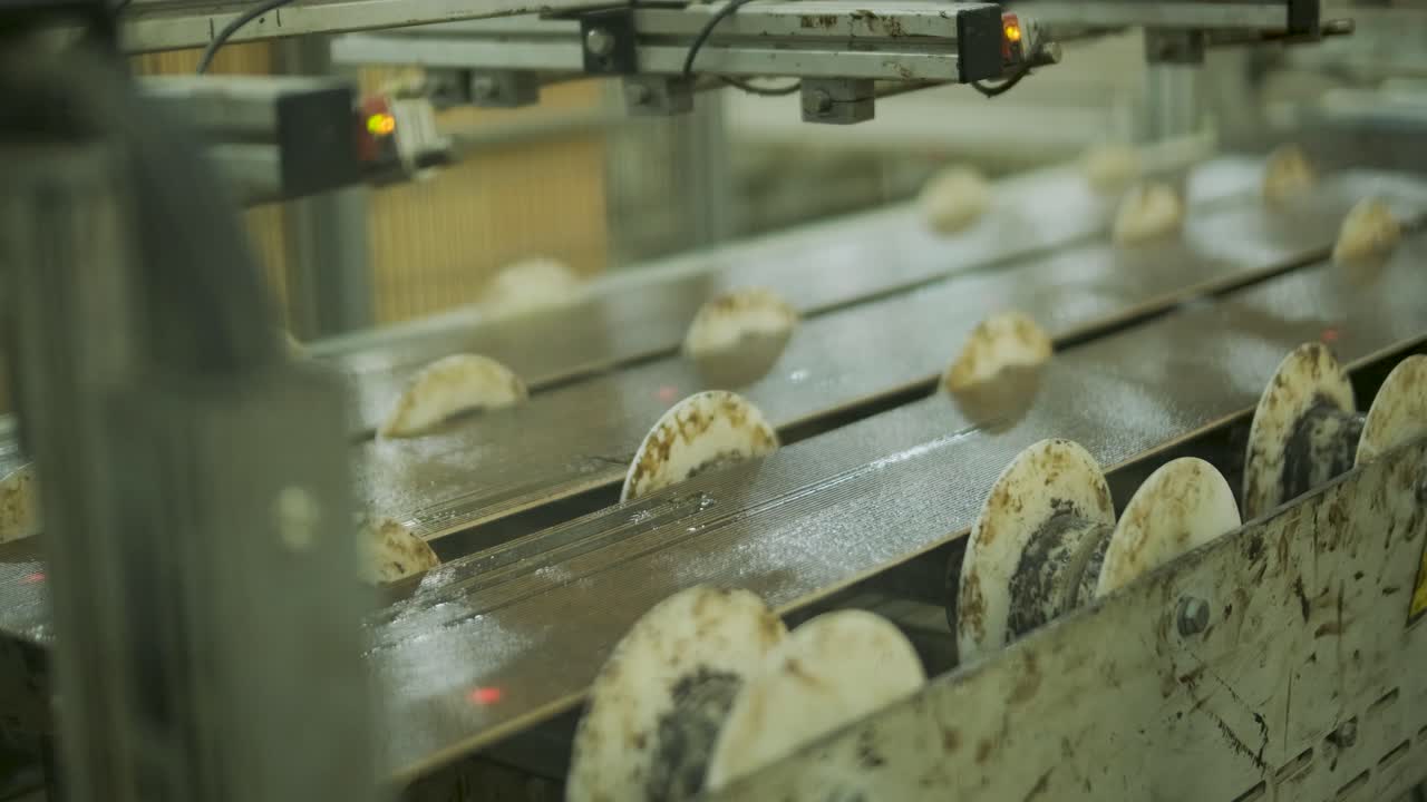 Automated Conveyor Belt Transporting Panels in Industrial Factory