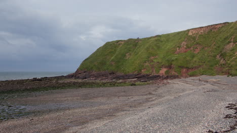 wide shot of saint bees sea front looking west onto st bees headland, west lake district