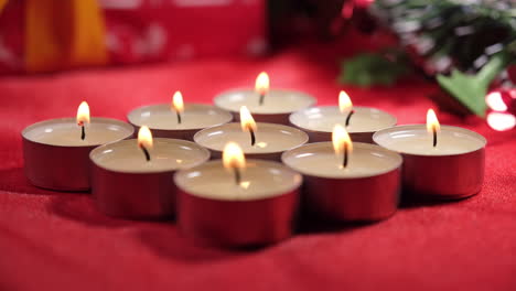 Christmas-candles-in-red-background