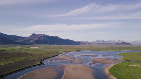 Aerial-Footage-of-River-Delt-with-Birds-Flying-by-During-Sunny-Summer-In-Snaefellsness-Peninsula,-Iceland