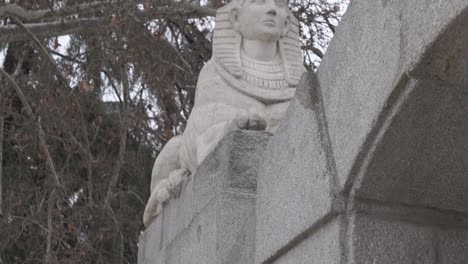 ancient statues in a park in a european country.