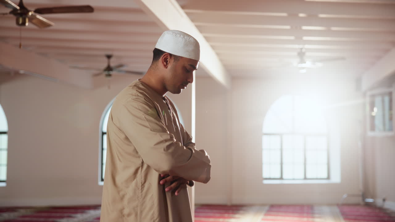 Muslim man praying in a mosque