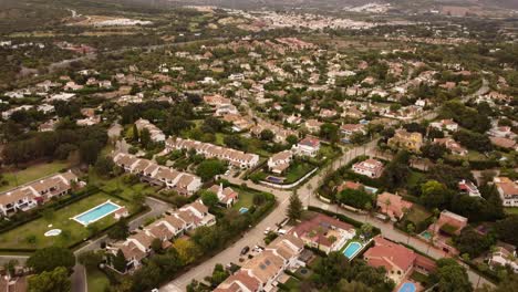 Top-down-aerial-view-Spanish-town-surrounded-by-nature-and-countryside