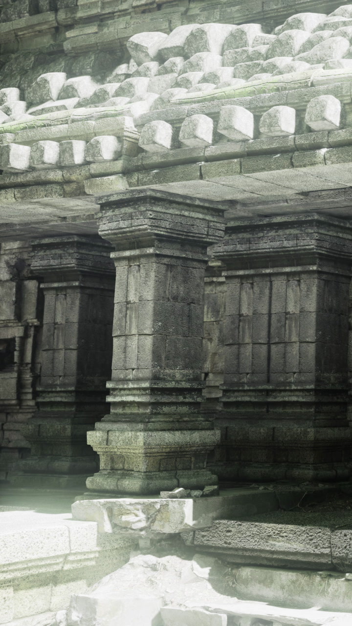 Mystical ruins of ancient stone pillars at dawn welcoming sunlight