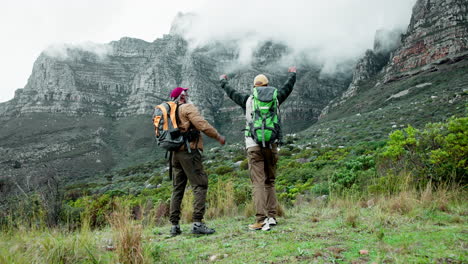 two men hiking in the mountains