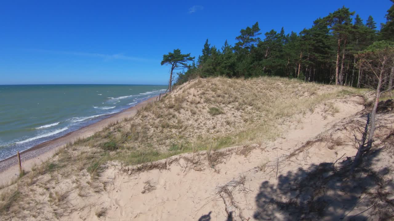 Baltic Sea Coastline Sandy Dunes on a Sunny Summer Day. Wide Angle Handheld Shot