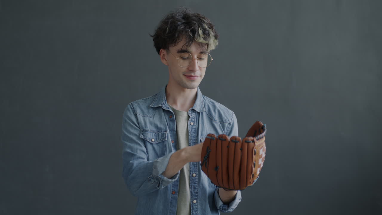 Young Man Holding a Baseball Glove