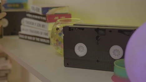 vhs cassettes on a shelf