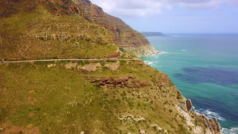 aerial of the beautiful coastline and narrow roads south of cape town south africa 1