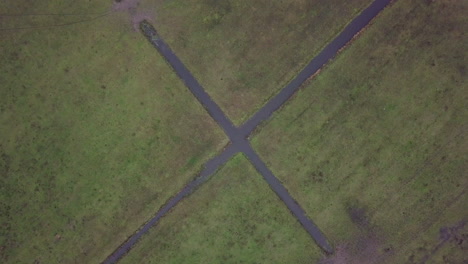 Aerial-drone-shot-of-flyover-the-water-irrigation-in-the-farm-fields-in-the-Netherlands