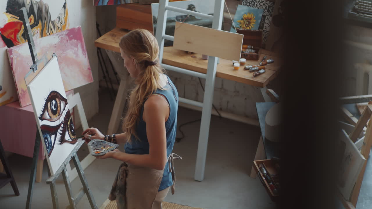 Woman Painting in an Art Studio