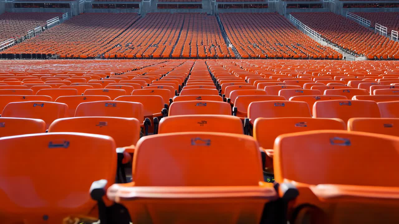 Empty Orange Seats in a Stadium