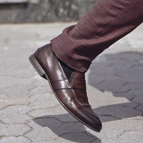 businessman walking upstairs outside