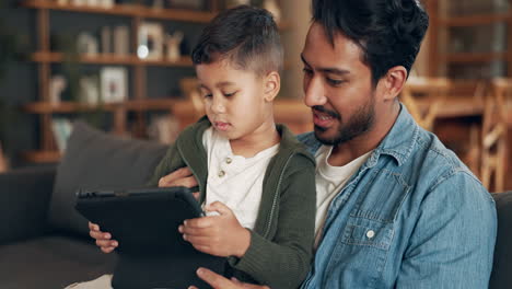 Tablet,-learning-and-father-with-child-on-sofa