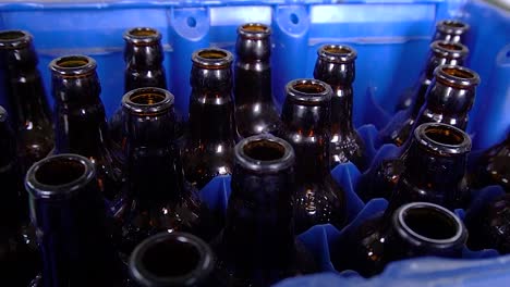 old bottles on a box waiting to be disposed on the right places