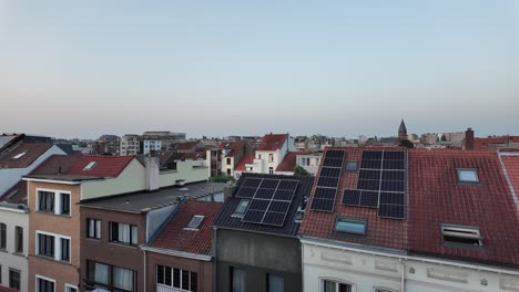 solar rooftops with camera revealing skyline in brussels