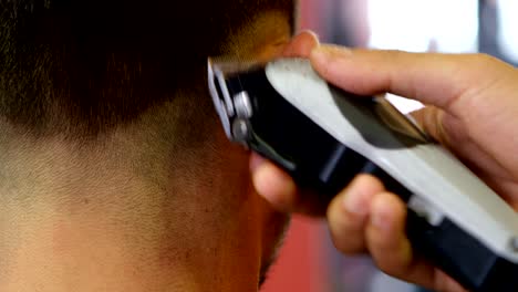 man getting his hair cut by hairdresser 4k