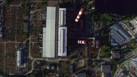 Aerial-view-industrial-pipes-power-plant-area-Drone-view-chimney-heating-plant