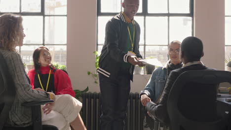 young-business-people-meeting-african-american-team-leader-man-sharing-documents-discussing-marketing-strategy-brainstorming-ideas-planning-successful-deadline-in-diverse-office-briefing