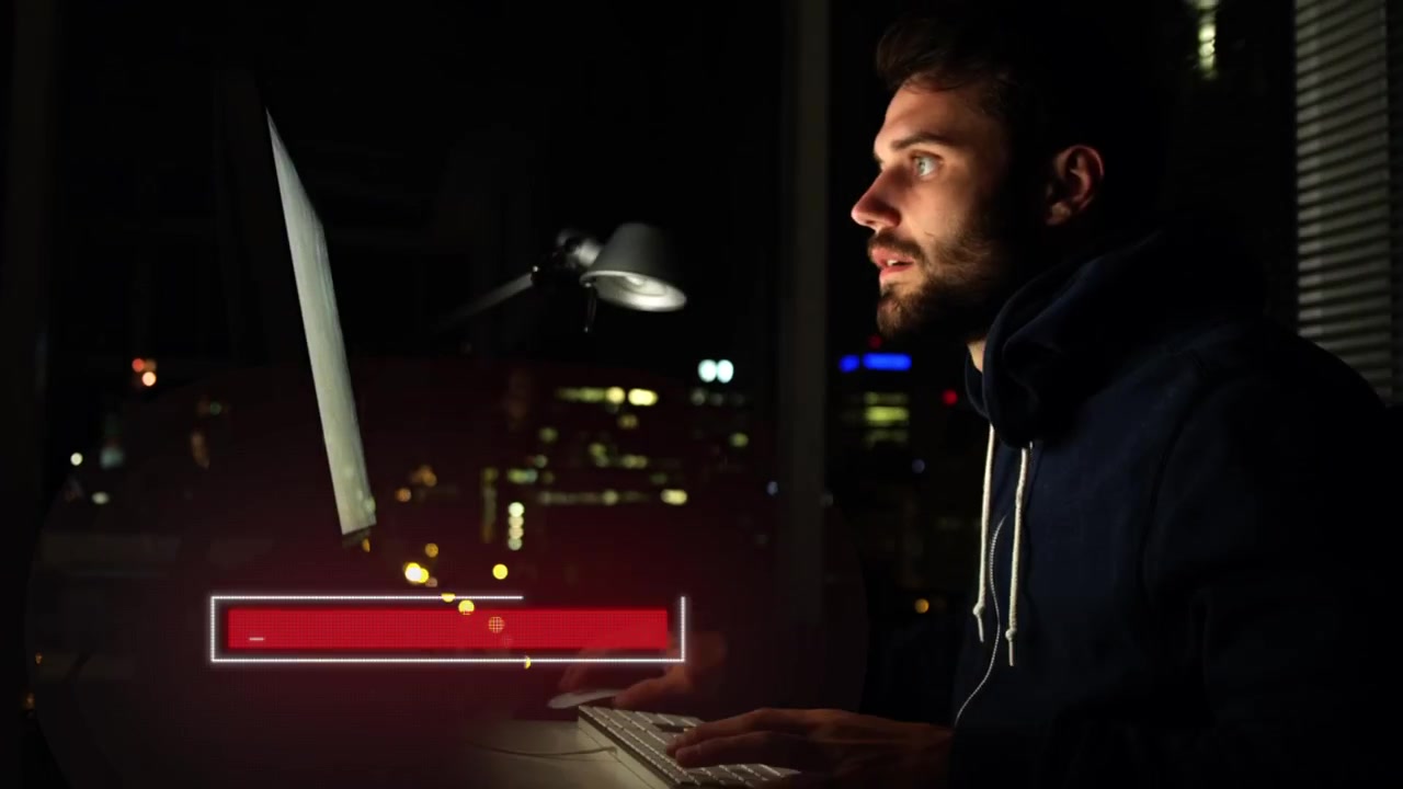 Young Programmer Coding on Computer in Dark Office at Night
