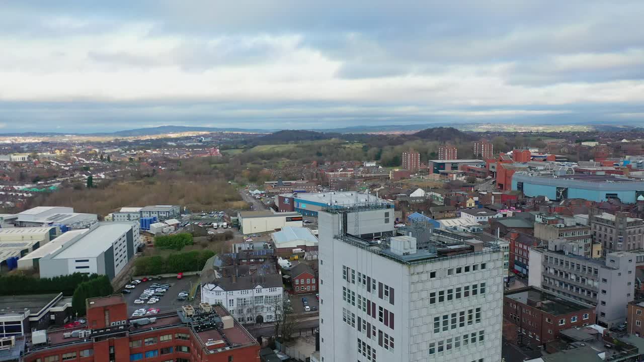 Aerial views of the main town in the potteries Stoke on Trent, Hanley the city centre with high rise buildings and a beautiful city landscape, immigration housing and high rise flats