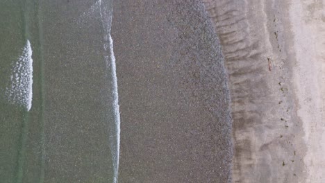 coastal beach waves aerial top down view grey bay, near sandpit, bc, canada