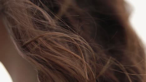 woman's profile and hair in close-up