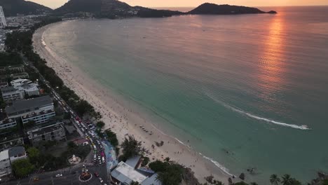 patong beach in phuket aerial high rise of popular travel destination in thailand during sunset.