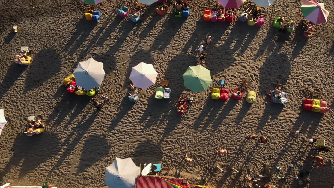 Beach Scene with People and Umbrellas