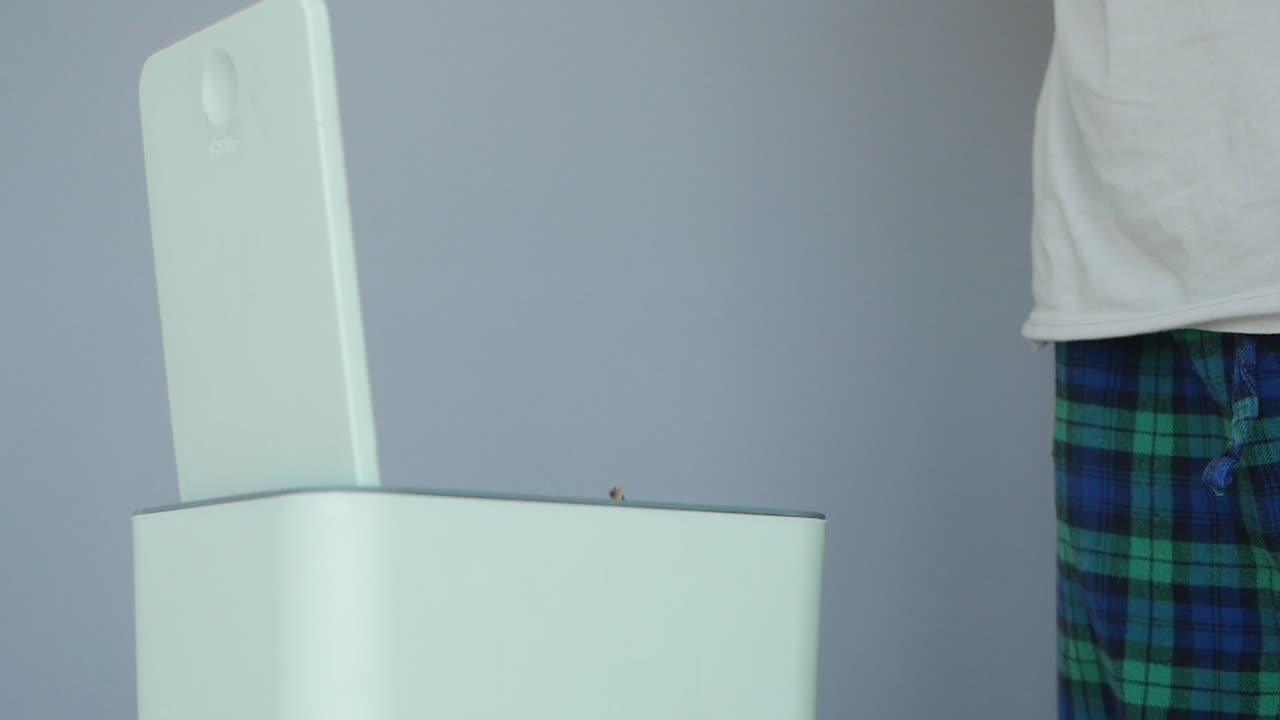 Throwing away a rotten banana