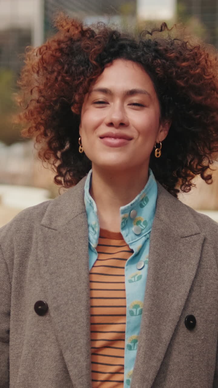 Happy Woman Walking in a Modern City Park