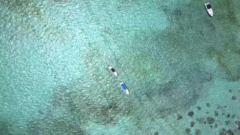 AERIAL:-Boats-in-crystal-clear-blue-water