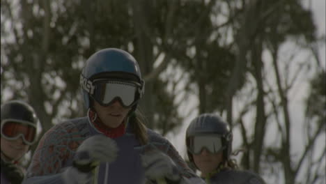 a skier launches herself off of the starting line